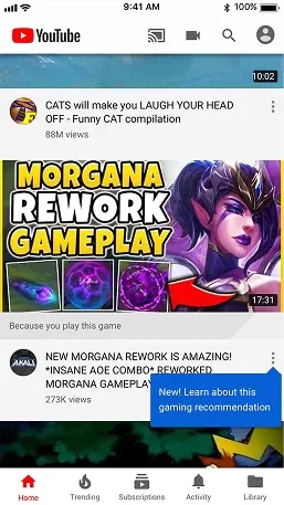YouTube home feed with a gaming recommendation carrying a Below the thumbnail badge that reads New! Learn about this gaming recommendation